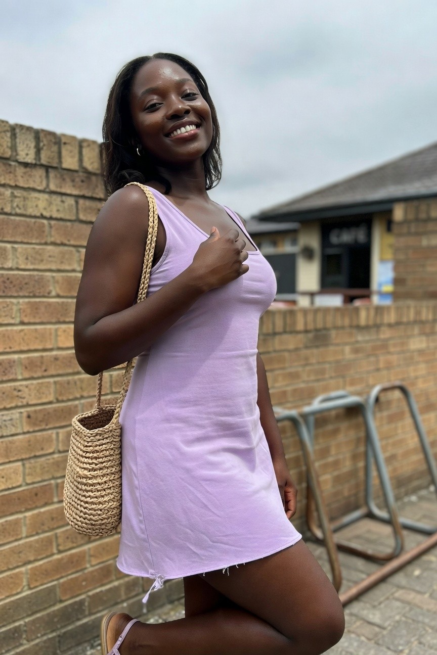 Lavender Mini Dress With A Straw Bag