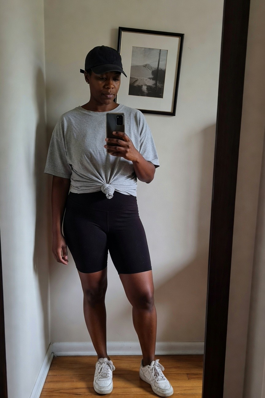 Gray Tee Knotted Over Black Biker Shorts