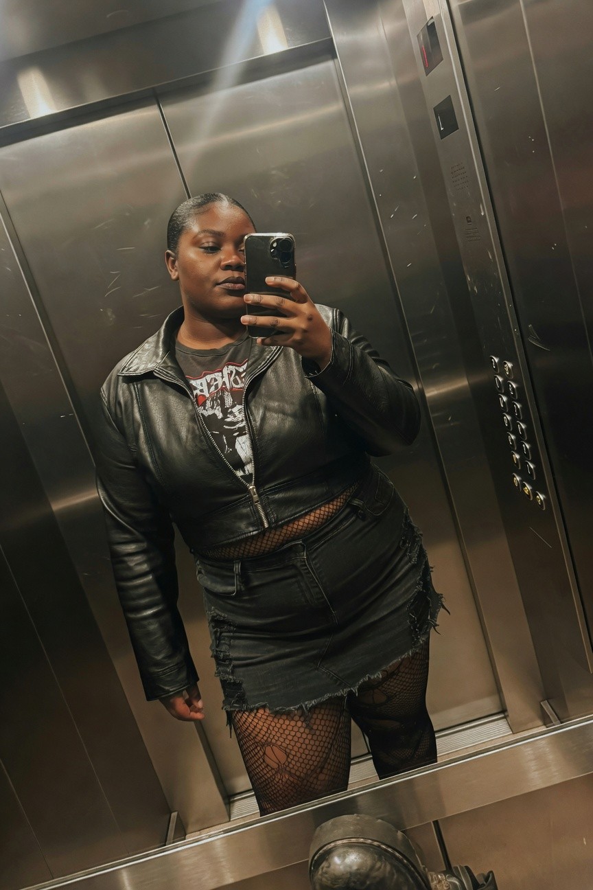 Leather Jacket Over Graphic Tee And Denim
